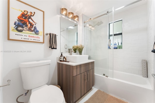 2485 SW 19th Ter, Miami, FL 33145 - full bath featuring vanity, combined bath / shower with glass door, and tile patterned floors