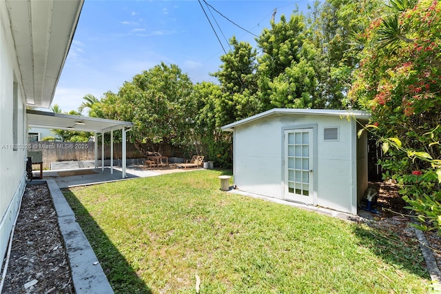 2485 SW 19th Ter, Miami, FL 33145 - view of yard featuring a patio and a shed