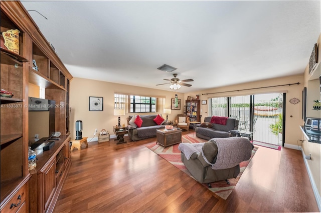 11193 SW 113th Ter, Miami, FL 33176 - living room with wood finished floors, healthy amount of natural light, and ceiling fan