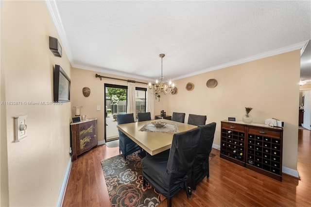 11193 SW 113th Ter, Miami, FL 33176 - dining room featuring crown molding, a chandelier, and wood finished floors