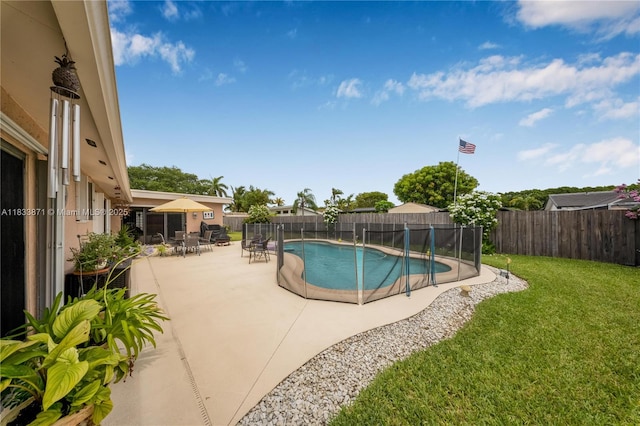 11193 SW 113th Ter, Miami, FL 33176 - view of swimming pool featuring a patio and a fenced backyard