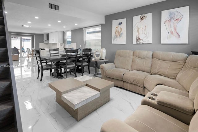 1158 W 41st St Unit 87, Hialeah, FL 33012 - living room featuring recessed lighting, light marble finish floors, and plenty of natural light
