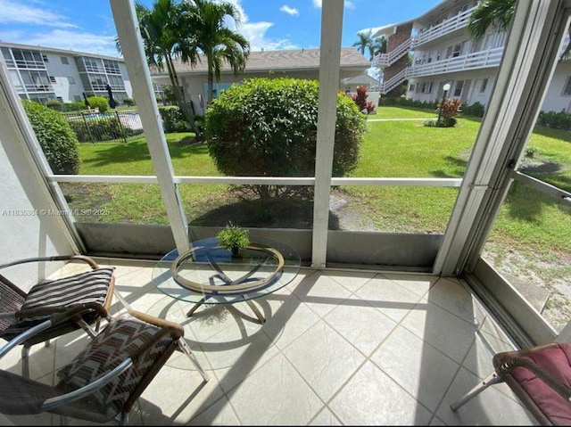 700 Layne Blvd Unit 115, Hallandale Beach, FL 33009 - sunroom featuring healthy amount of natural light