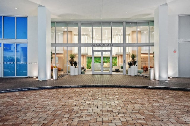 90 SW 3rd St Unit 3810, Miami, FL 33130 - common area with a wall of windows and a high ceiling