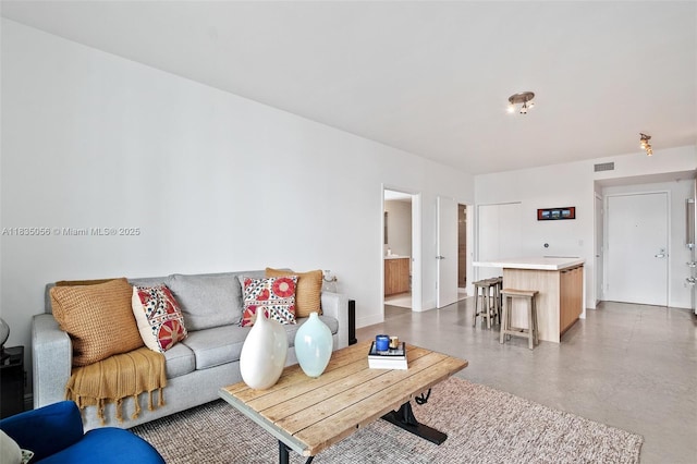 90 SW 3rd St Unit 3810, Miami, FL 33130 - living area with concrete flooring and baseboards
