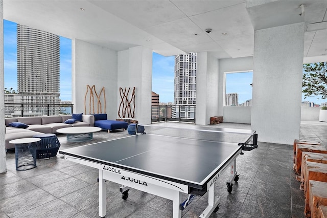 90 SW 3rd St Unit 3810, Miami, FL 33130 - game room with a wall of windows, healthy amount of natural light, and a city view