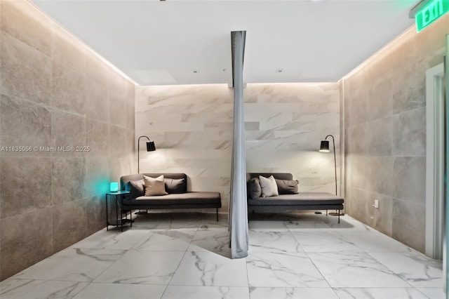 90 SW 3rd St Unit 3810, Miami, FL 33130 - bathroom featuring tile walls and marble finish flooring