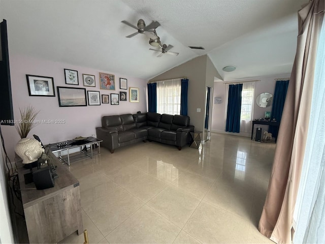 14135 SW 100th Ln, Miami, FL 33186 - living area with a ceiling fan, healthy amount of natural light, light tile patterned floors, and lofted ceiling