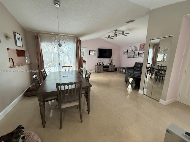 14135 SW 100th Ln, Miami, FL 33186 - dining room featuring vaulted ceiling, a textured ceiling, a ceiling fan, and light tile patterned flooring