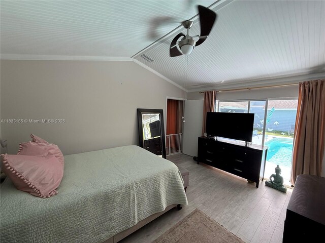 14135 SW 100th Ln, Miami, FL 33186 - bedroom with wood finished floors, vaulted ceiling, crown molding, and a ceiling fan