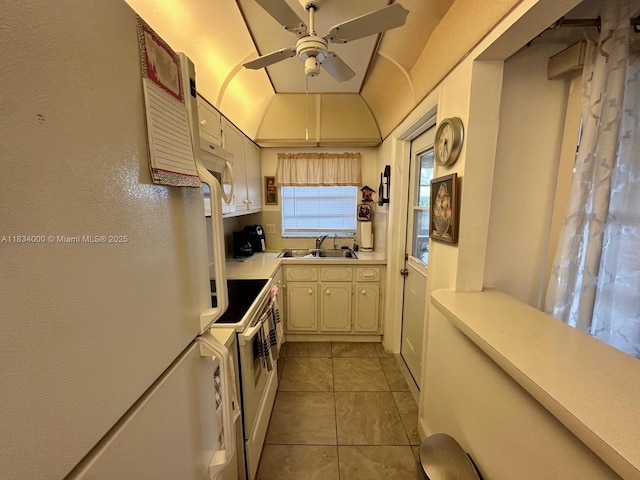 5300 Washington St Unit N318, Hollywood, FL 33021 - kitchen with white appliances, ceiling fan, light countertops, and light tile patterned floors