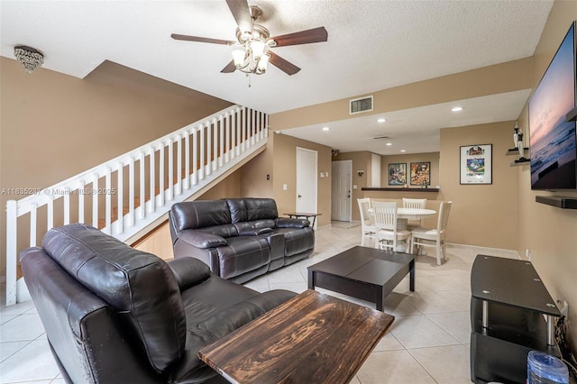1528 Veracruz Ln Unit 4-3, Weston, FL 33327 - living room featuring light tile patterned flooring, ceiling fan, and stairs