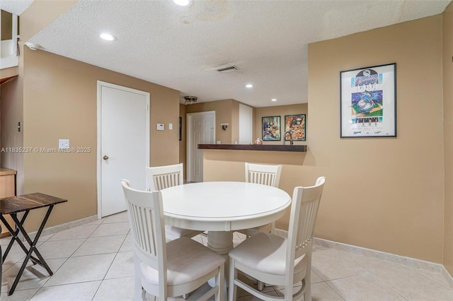 1528 Veracruz Ln Unit 4-3, Weston, FL 33327 - dining room featuring a textured ceiling, light tile patterned floors, and recessed lighting