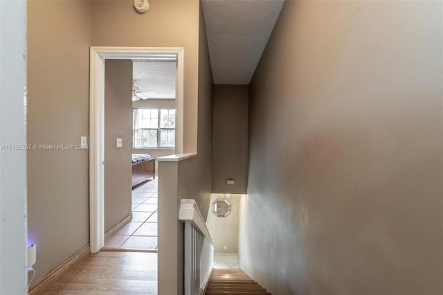 1528 Veracruz Ln Unit 4-3, Weston, FL 33327 - staircase with a textured ceiling and baseboards