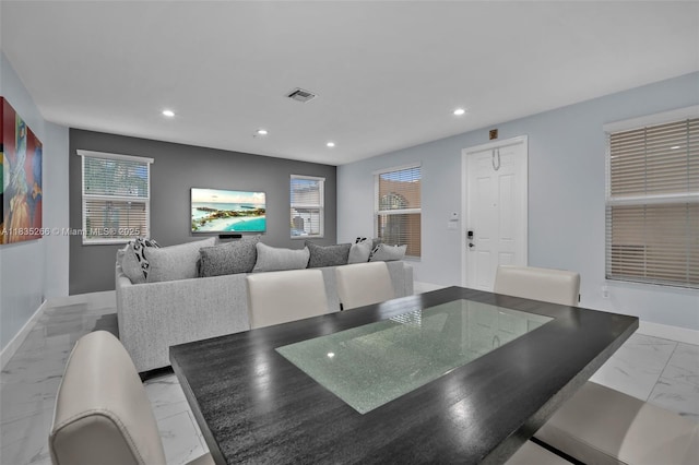 14646 SW 13th St, Pembroke Pines, FL 33027 - dining area featuring marble look tiles, recessed lighting, and plenty of natural light