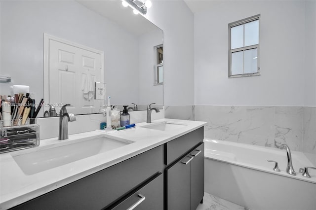 14646 SW 13th St, Pembroke Pines, FL 33027 - full bath featuring marble look tiles, double vanity, and a garden tub