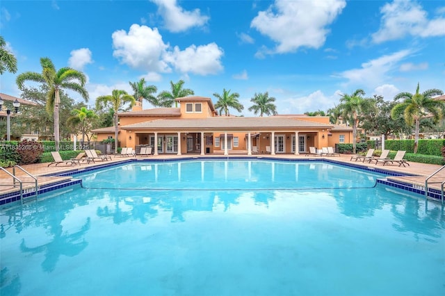 14646 SW 13th St, Pembroke Pines, FL 33027 - community pool featuring a patio area