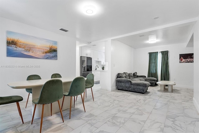 1100 NW 151st St, Miami, FL 33169 - dining space featuring light marble finish floors