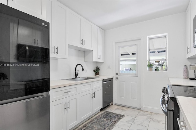 1100 NW 151st St, Miami, FL 33169 - kitchen featuring dishwasher, stainless steel electric range oven, refrigerator, light marble finish floors, and white cabinetry