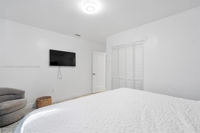 1100 NW 151st St, Miami, FL 33169 - bedroom featuring a closet and baseboards