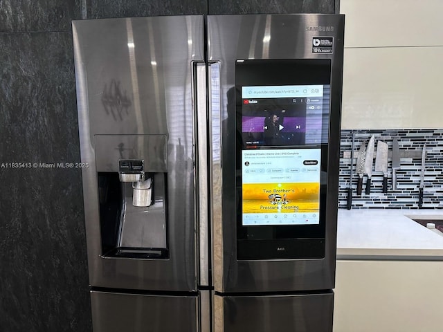 7427 NW 113th Path, Doral, FL 33178 - kitchen view of fridge with ice dispenser and decorative backsplash