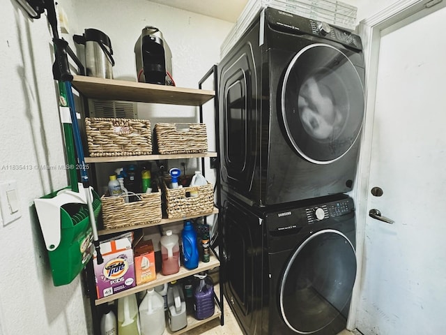 7427 NW 113th Path, Doral, FL 33178 - laundry room featuring stacked washer / dryer