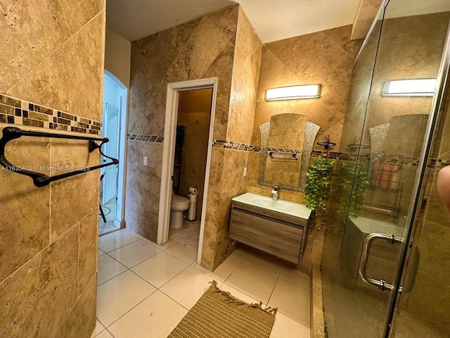 7427 NW 113th Path, Doral, FL 33178 - full bath with tile walls, vanity, a shower stall, and tile patterned flooring