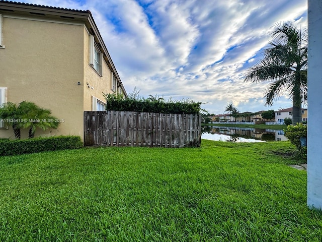 7427 NW 113th Path, Doral, FL 33178 - view of yard featuring a water view