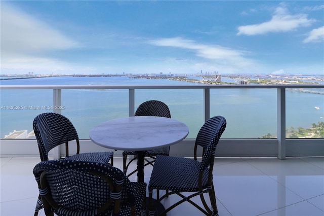 2020 N Bayshore Dr Unit 2801, Miami, FL 33137 - balcony with a water view and outdoor dining area