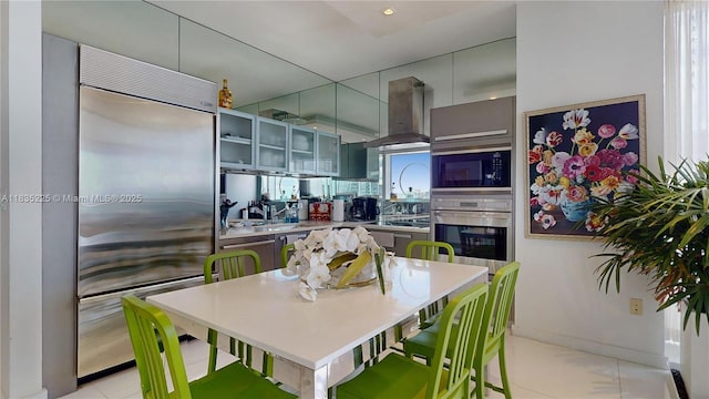 2020 N Bayshore Dr Unit 2801, Miami, FL 33137 - kitchen with built in appliances, range hood, and recessed lighting
