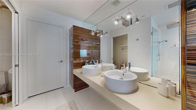 2020 N Bayshore Dr Unit 2801, Miami, FL 33137 - full bathroom featuring a shower stall, double vanity, and tile patterned floors
