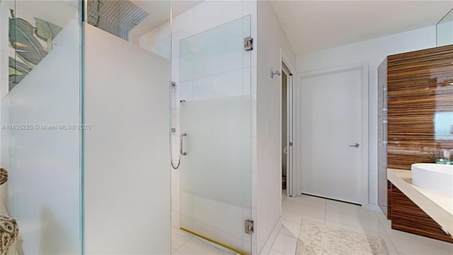 2020 N Bayshore Dr Unit 2801, Miami, FL 33137 - bathroom featuring a stall shower, tile patterned flooring, and vanity