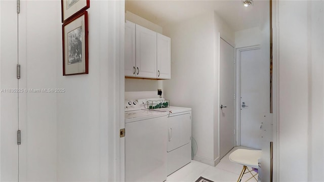 2020 N Bayshore Dr Unit 2801, Miami, FL 33137 - laundry room with independent washer and dryer, cabinet space, and light tile patterned floors