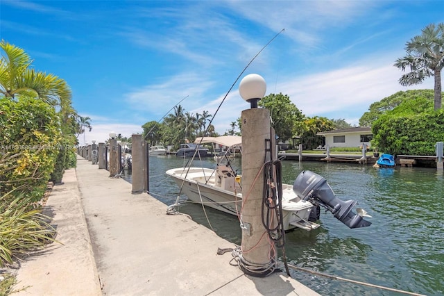 1426 NE 105th St Unit D9, Miami Shores, FL 33138 - dock area featuring a water view