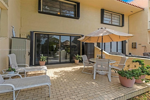 1426 NE 105th St Unit D9, Miami Shores, FL 33138 - view of patio featuring outdoor dining space