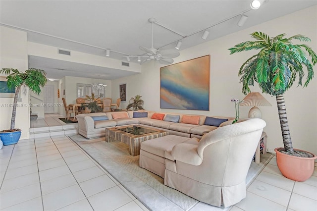 1426 NE 105th St Unit D9, Miami Shores, FL 33138 - tiled living area with rail lighting and ceiling fan