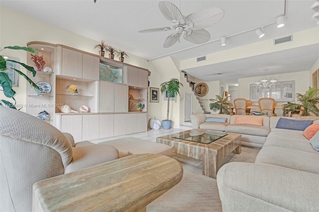 1426 NE 105th St Unit D9, Miami Shores, FL 33138 - living room with a chandelier, track lighting, and ceiling fan