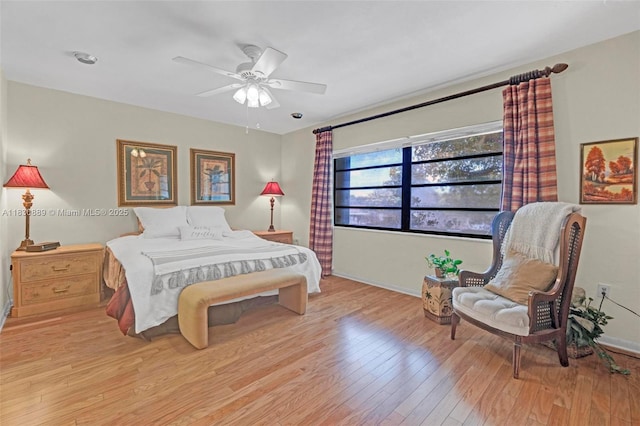 1426 NE 105th St Unit D9, Miami Shores, FL 33138 - bedroom with light wood-style floors and ceiling fan
