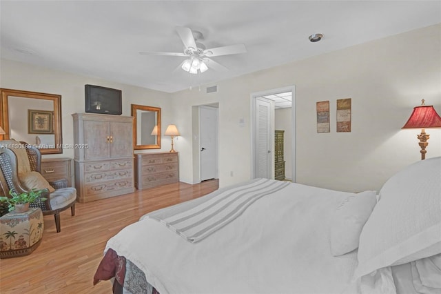 1426 NE 105th St Unit D9, Miami Shores, FL 33138 - bedroom with wood finished floors and a ceiling fan