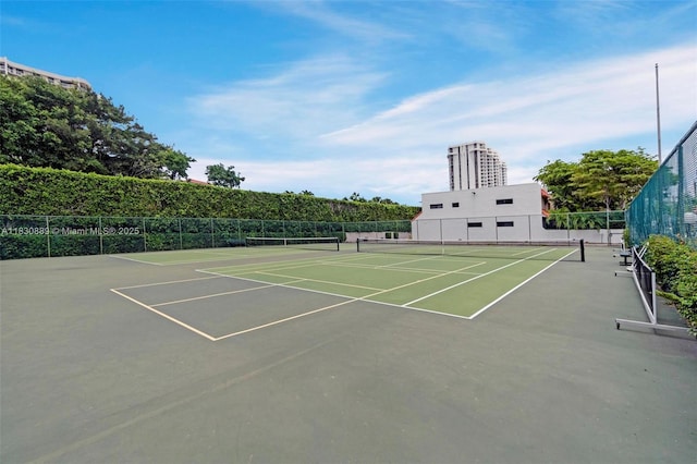 1426 NE 105th St Unit D9, Miami Shores, FL 33138 - view of tennis court with community basketball court