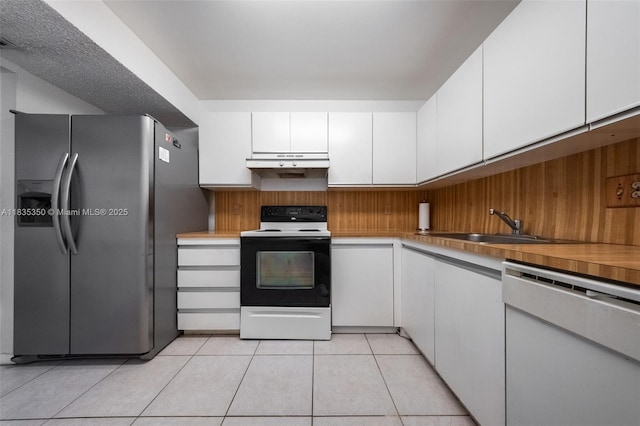2500 Parkview Dr Unit 1502, Hallandale Beach, FL 33009 - kitchen with electric range oven, stainless steel fridge with ice dispenser, dishwasher, light tile patterned flooring, and white cabinets