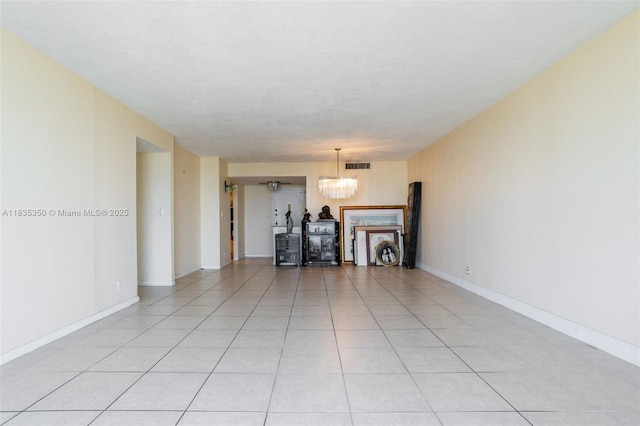 2500 Parkview Dr Unit 1502, Hallandale Beach, FL 33009 - unfurnished living room featuring a chandelier and light tile patterned flooring