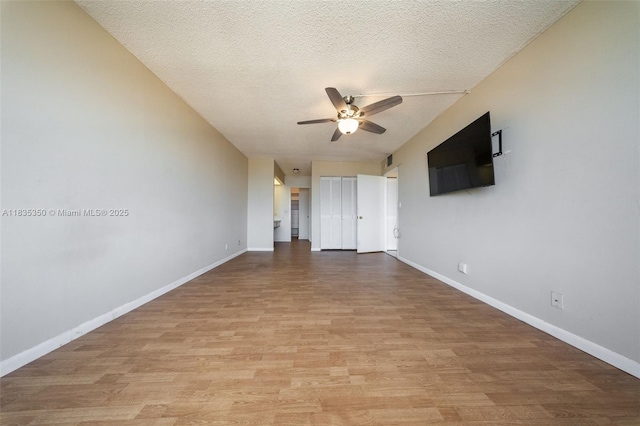 2500 Parkview Dr Unit 1502, Hallandale Beach, FL 33009 - spare room with a ceiling fan, a textured ceiling, and light wood-style flooring
