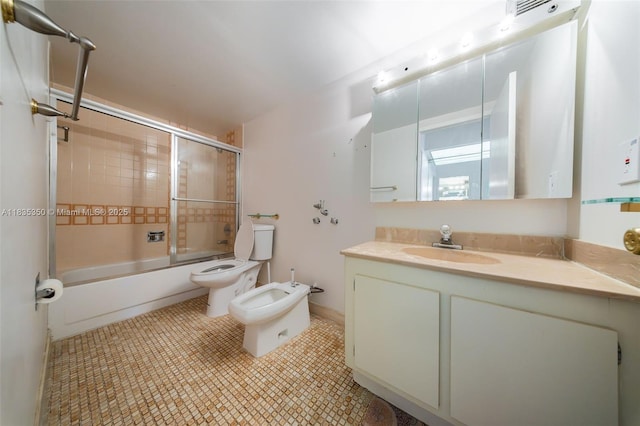 2500 Parkview Dr Unit 1502, Hallandale Beach, FL 33009 - full bathroom featuring a bidet, vanity, combined bath / shower with glass door, and tile patterned flooring