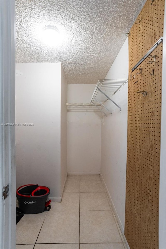 2500 Parkview Dr Unit 1502, Hallandale Beach, FL 33009 - walk in closet featuring tile patterned flooring