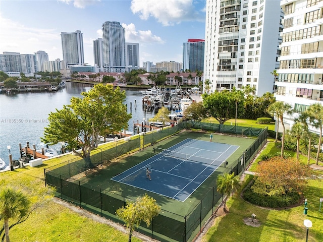 2500 Parkview Dr Unit 1502, Hallandale Beach, FL 33009 - view of tennis court with a skyline view and a water view