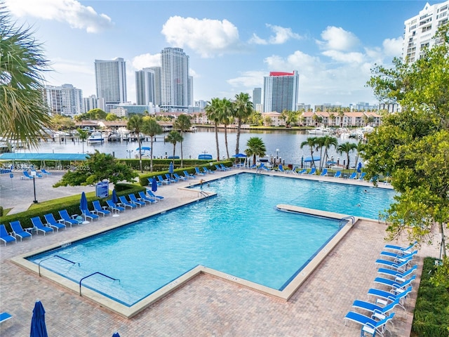 2500 Parkview Dr Unit 1502, Hallandale Beach, FL 33009 - community pool with a water view, a skyline view, and a patio
