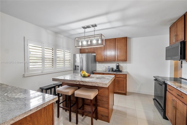 1706 Hammock Blvd Unit 110, Coconut Creek, FL 33063 - kitchen with stainless steel refrigerator with ice dispenser, electric range, and brown cabinetry