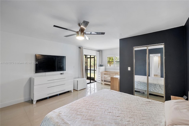 1706 Hammock Blvd Unit 110, Coconut Creek, FL 33063 - bedroom with light tile patterned flooring, a ceiling fan, and access to outside