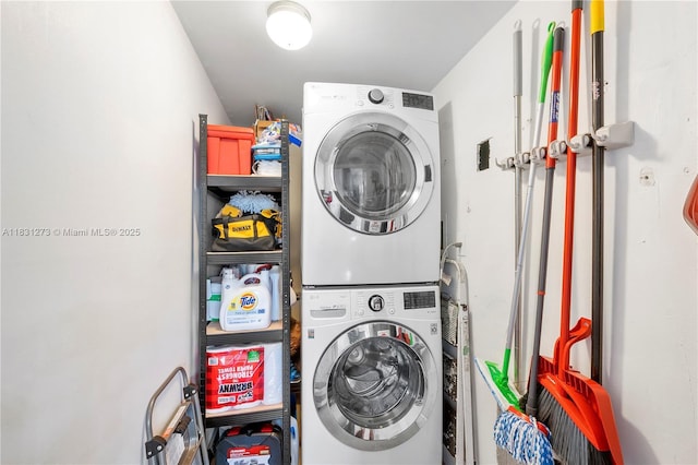 1706 Hammock Blvd Unit 110, Coconut Creek, FL 33063 - washroom featuring stacked washer and clothes dryer